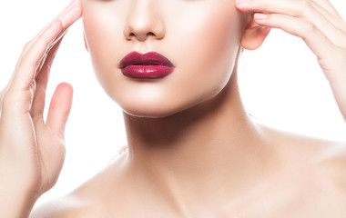 Fototapeta na wymiar Red glossy lips, beauty woman part of face, clean skin. Facial treatment concept