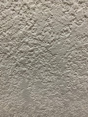 Fondo y textura de pared clara en acabado rústico planchado 
