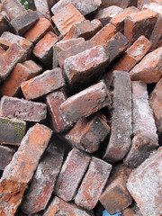 Brick fragments scattered on the ground, abstract background