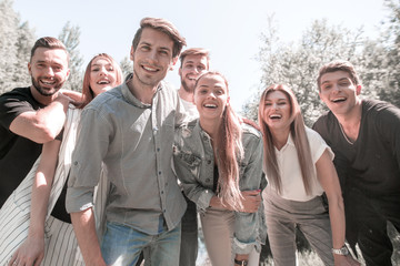 group of successful youth on the background of nature