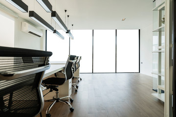 Fototapeta na wymiar modern office furniture in workspace interior corporate background