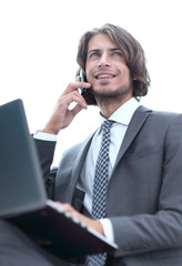 closeup.serious businesswoman talking on the smartphone