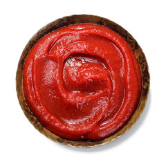 Tomato sauce isolated on white background  top view.