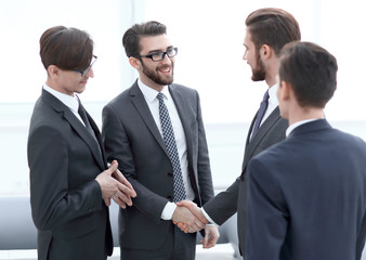 handshake business people in the office.