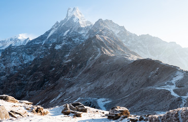 Fototapeta na wymiar Machapuchare, Mardi Himal view at early morning. A mountain range in the Annapurna Himalayas of north central Nepal. View point from Mardi Himal base camp track