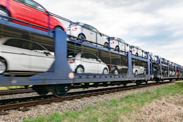 Railroad transport of the newly manufactured cars from factory