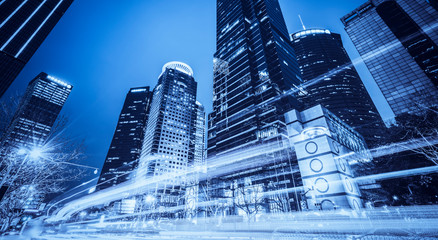 Urban Nightscape Architecture Street and Fuzzy Car Lights..