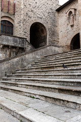 Stone stairs on a medieval town in San Gimignano, Tuscany, Italy