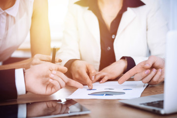 Group of business people at meeting  discussing financial results 