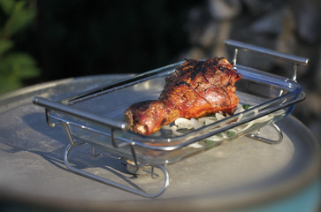 Snack For Outdoor Summer Barbeque Party.Family dinner in the open air. Barbeque grilled turkey legs. cooking on open fire
