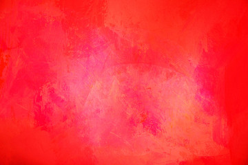 The abstract bright red surface has a brush painted on the background for graphic design. 