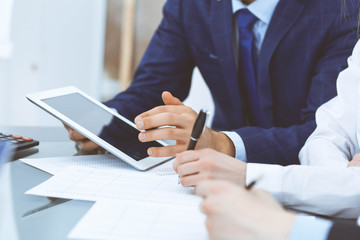 Bookkeepers team or financial inspectors  making report, calculating and checking balance. Tax service financial document. Audit or meeting concept