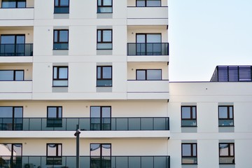 Fototapeta premium Modern european complex of apartment buildings. Fragment of a modern residential apartment building