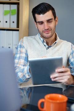 Young man with tablet pc