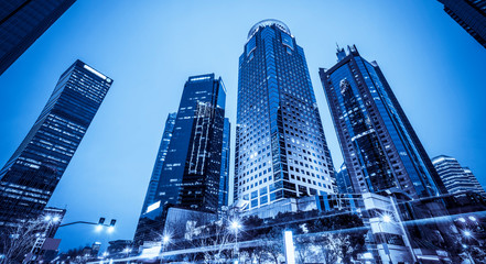 Fototapeta premium Urban Nightscape Architecture Street and Fuzzy Car Lights..