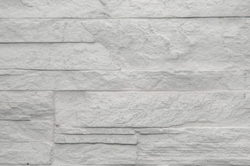 Brick wall of white-gray color, background saver.