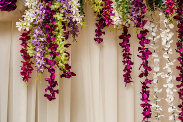 Wedding decorarion of tender white, purple and pink flowers