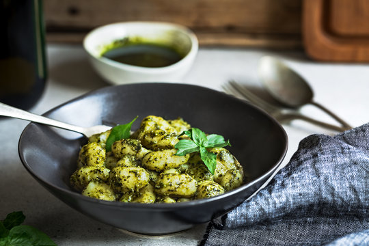 Gnocchi in homemade Basil Pesto sauce in a bowl