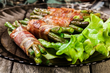 Fried green bean wrapped in smoked bacon
