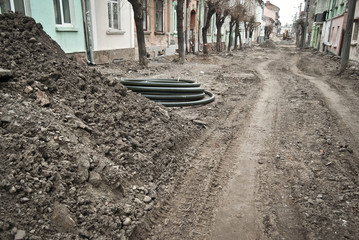 The street of the city is torn down. Construction and laying of pipelines and sewerage. Chernivtsi,...
