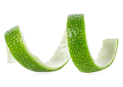 Fresh lime peel isolated on a white background. Lime twist. Lime skin.