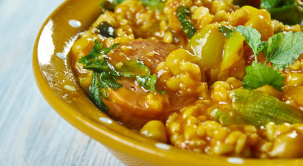 Spinach, sausage and chickpea hotpot