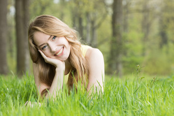Girl laying on the grass