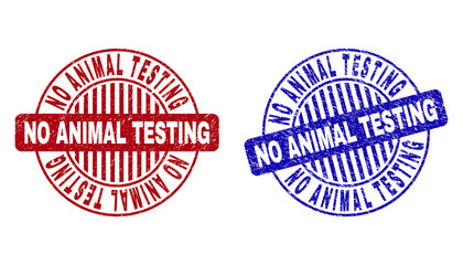 Grunge NO ANIMAL TESTING round stamp seals isolated on a white background. Round seals with grunge texture in red and blue colors.