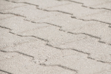 Fototapeta na wymiar Street pavement cement slabs surface closeup as background