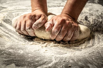 Zelfklevend Fotobehang Making dough by male hands at bakery. Food concept © Надія Коваль