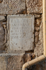 Roman tombstone on a wall in Tarragona, Catalonia, Spain