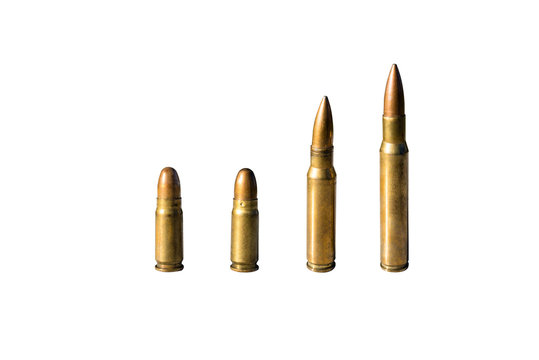 Four pieces of sharp ammunition with caliber 8mm and 12.7mm standing in a row, isolated on a white background with a clipping path and space for text.