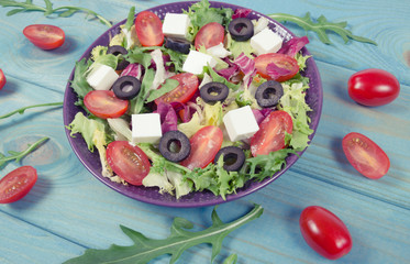 Fresh vegetable salad with feta cheese. Proper nutrition.