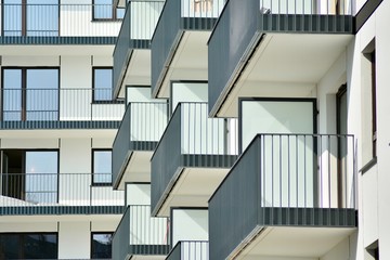 Fototapeta premium Modern european complex of apartment buildings. Fragment of a modern residential apartment building.