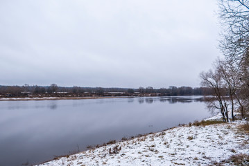 Winter landscape with river and trees