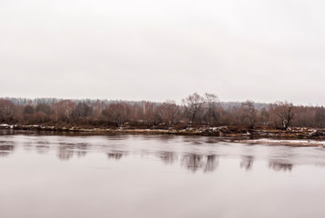 Winter landscape with river and trees