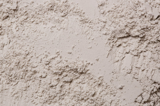 Cosmetic clay powder textured background, close up, 