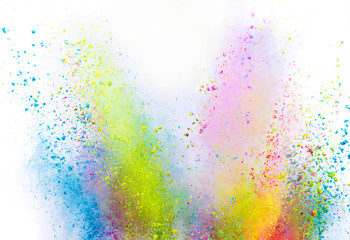 Colored powder explosion on white background.