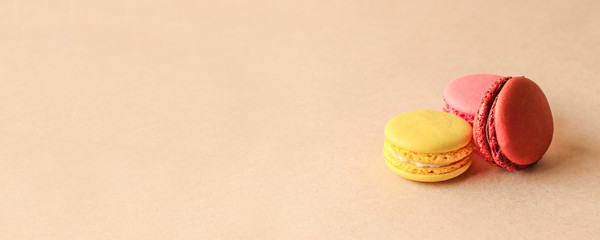 Tasty colorful macaroons on a background