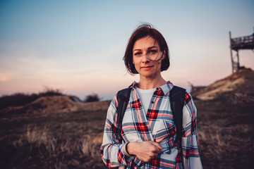 Portrait of woman hiking on mountain