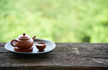 Chinese tea set oriental drink style on Natural green backdrop