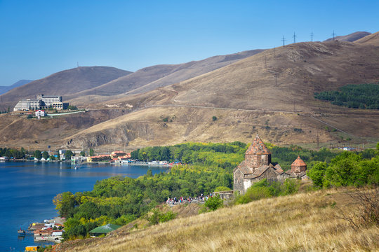 Scenic view of an old Sevanavank church in Sevan, Armenia on autumn day, blue sky