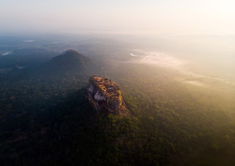 Sunrise over Sigiriya rock fortress in Sri Lanka aerial view