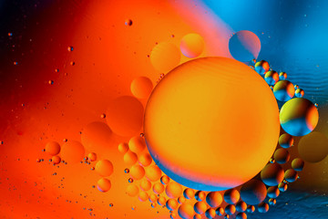Abstract background with colorful gradient colors. Oil drops in water abstract psychedelic pattern...