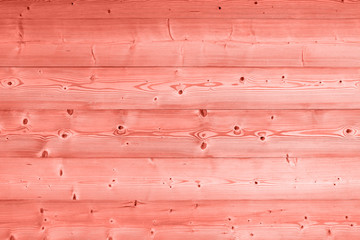 Coral pink toned vintage wooden planks background