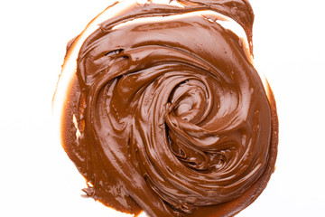 Chocolate cream isolated on white background. Flat lay.