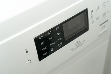 Close-up. Display on the washing machine to control the settings of the washing mode