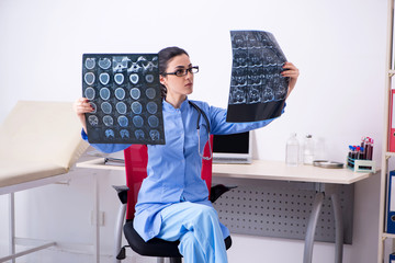 Young female doctor radiologist working in the clinic 