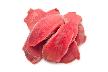 Veal pieces raw isolated on white background.