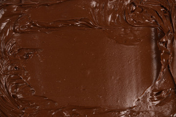 Chocolate cream background. Space for text or design.